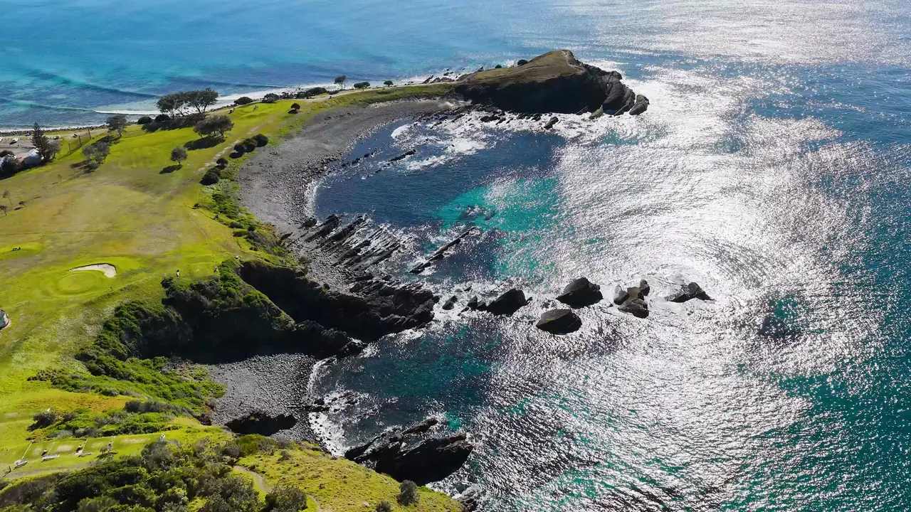 Aerial view of a rocky headland and coastline
