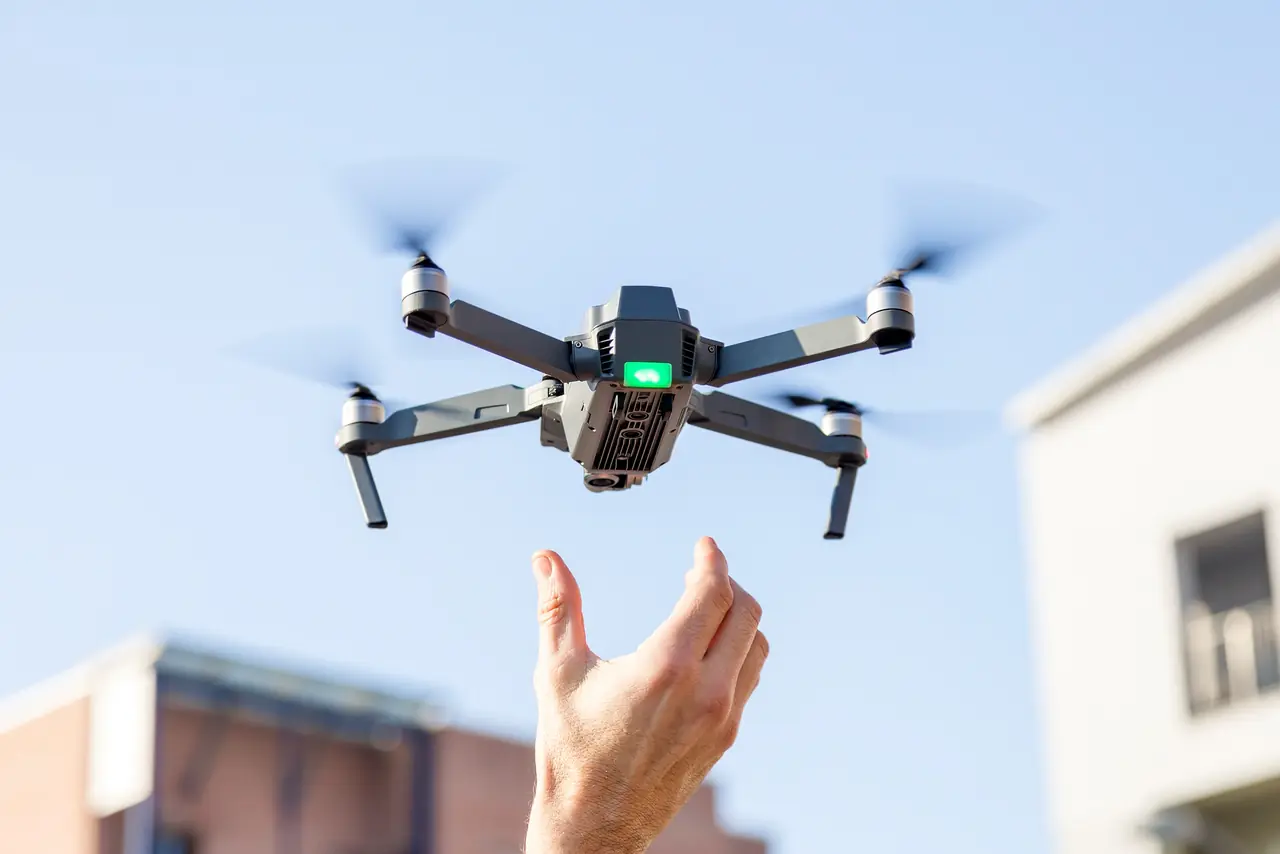 Drone being caught by hand